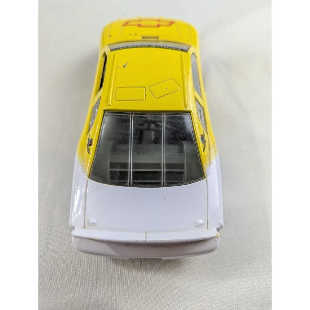 1996 Racing Champions Chevrolet BriCkyard 400 1:64 Monte Carlo Car Yellow
